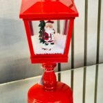 Faro navideño con música y luz 32cm
